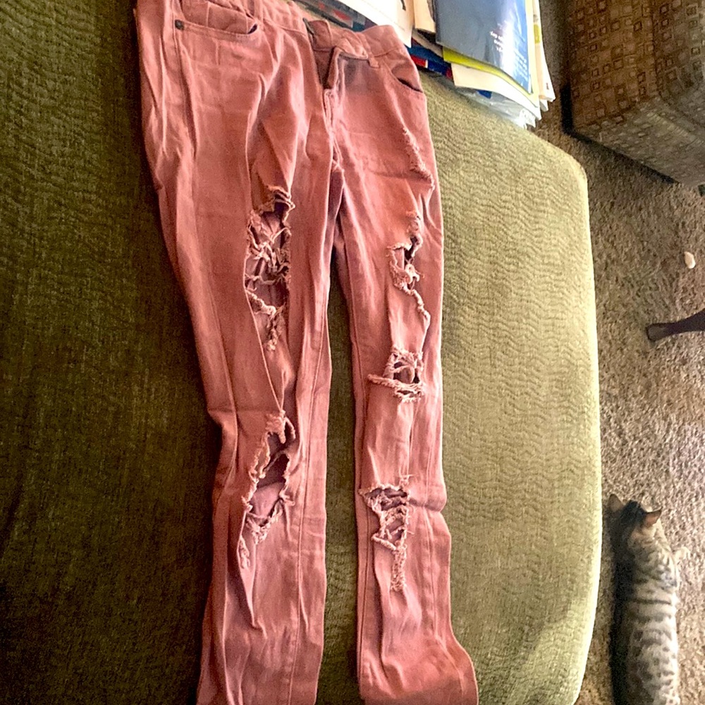 Burgundy pink ripped jeans